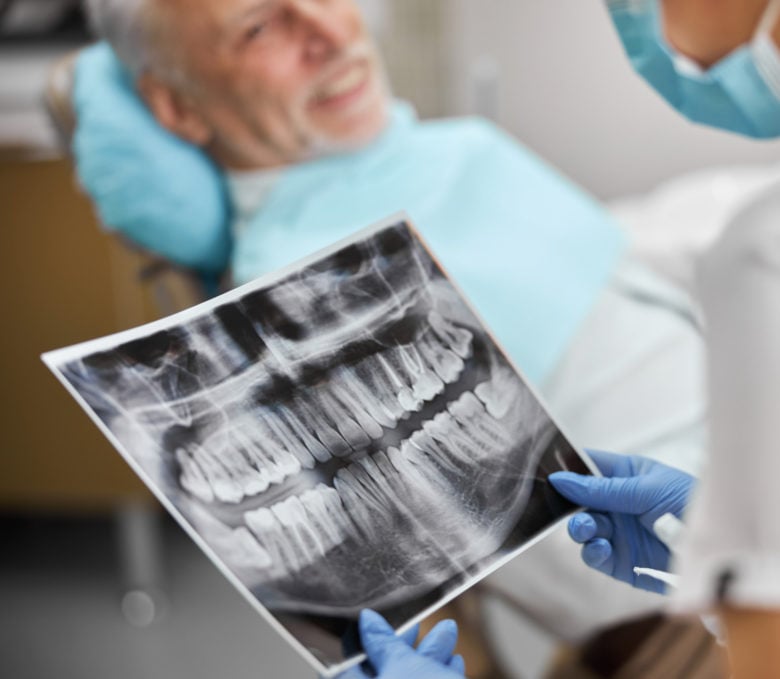 dr looking at xrays